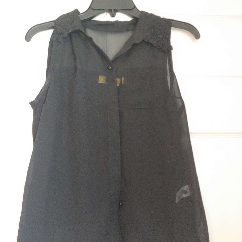 Black buttoned up top